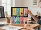 Custom keychains displayed in a vibrant workspace showcasing a variety of designs and packaging.